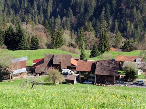 Old Traditional Houses And Typical Swiss Subalpine Rural Architecture