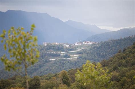 The View From The Height Of A Green Mountain Valley With Residential