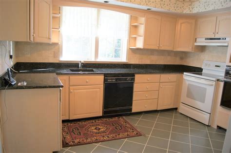 Pickled oak cabinets has me in a pickle over wall color. Pickled oak cabinets | 4001 Roundtop Road, Baltimore 21218 | Pinterest