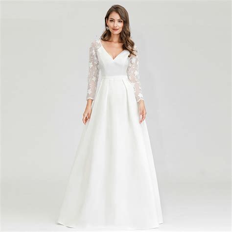 Modest minimalist style ball gown wedding dress with elegant simple lines, accented with buttoned sleeves. 25 Long Sleeve Wedding Dresses You Will Fall in Love With ...