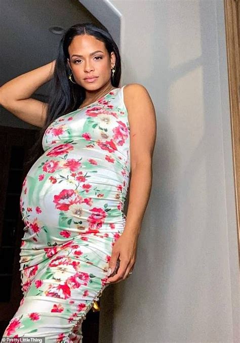 Pregnant Christina Milian Displays Her Growing Baby Bump In A Floral