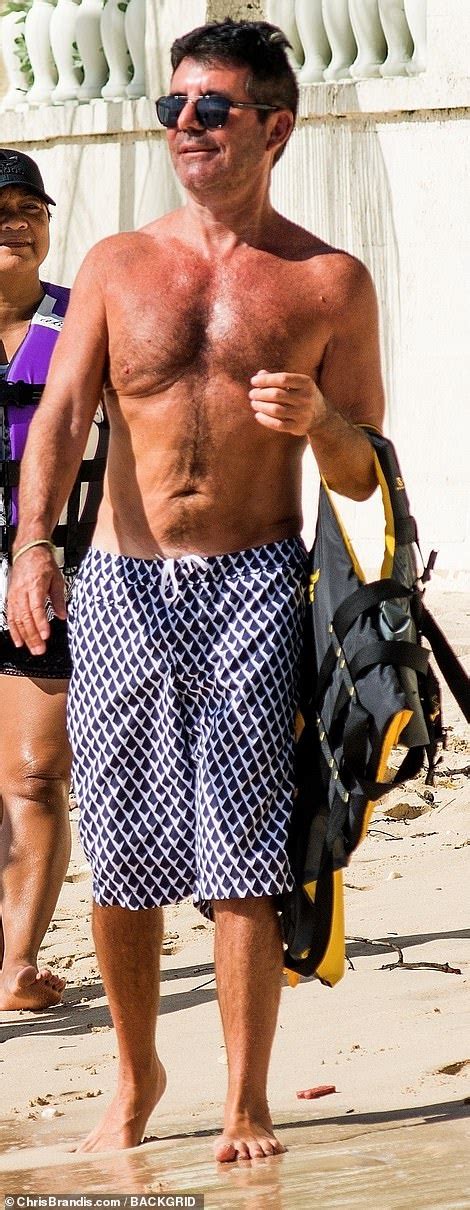 simon cowell looks on fine form as continues to showcase his newly slimmed down physique in