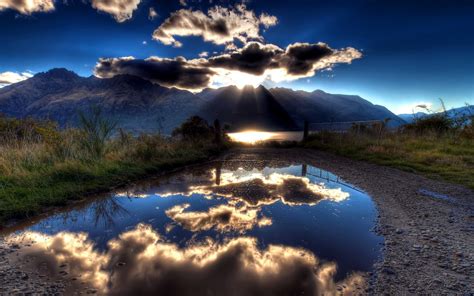 1680x1050 1680x1050 Sun Clouds Lake Reflection Light Shadows
