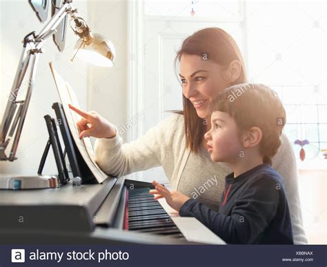 Child Playing Piano Stock Photos And Child Playing Piano Stock Images Alamy