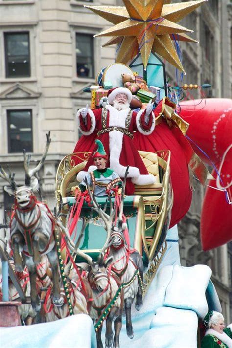 A Float With Santa Claus Riding On Its Back