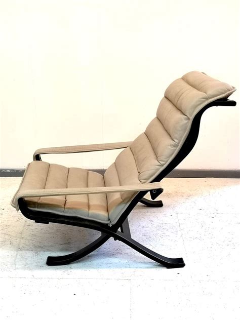 The most common leather chair repair material is leather. Full leather vintage Folding Lounge Chair with Ottoman by ...