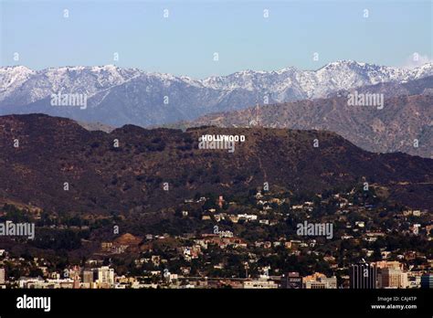 Snow Covered The Mountains Behind The Hollywood Sign Is Seen Monday