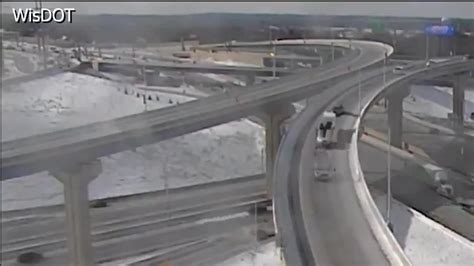 Driver Survives 70 Foot Plunge After Skidding Off Wisconsin Overpass