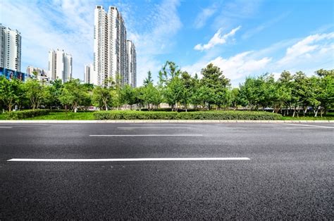 Road With A Buildings And Park Background Photo Free Download