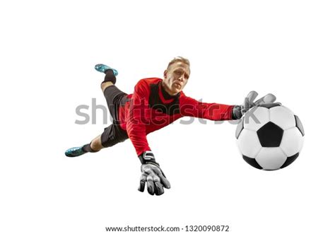 Male Soccer Player Goalkeeper Catching Ball Stock Photo 1320090872