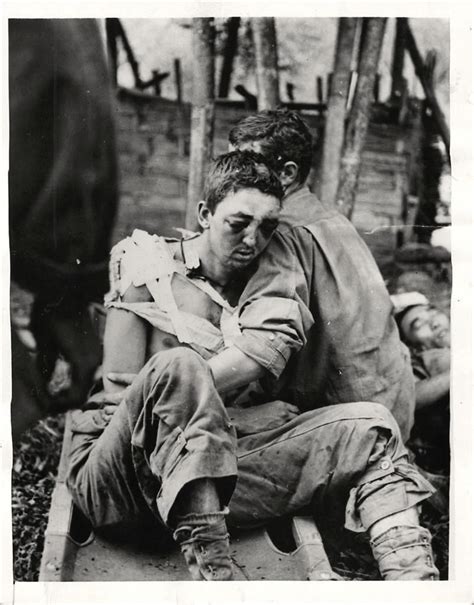 1944 Wounded U S Soldier Is Helped From Stretcher By Fellow Soldier After Participating In The