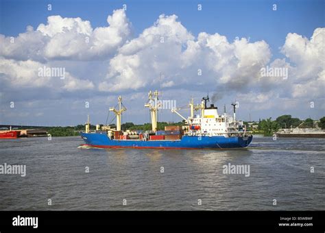 A Small Freighter Cargo Carrying Ship On The Mississippi River Near St