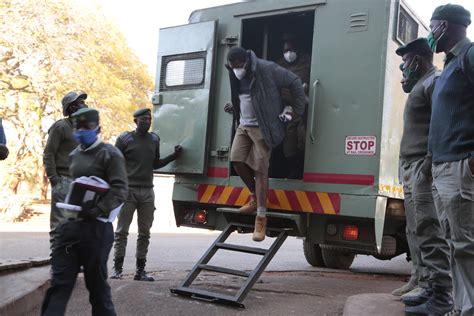 zimbabwe court denies bail to journalist over anti govt