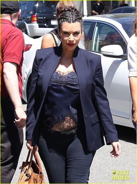 Kim Kardashian Bares Pregnant Baby Bump In Belly Shirt Photo
