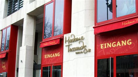 A collection of waxwork figures. Madame Tussauds