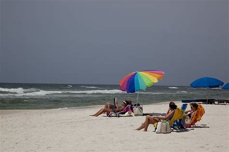 Sunbathers Beach Sand White Ocean Free Image From Needpix Com
