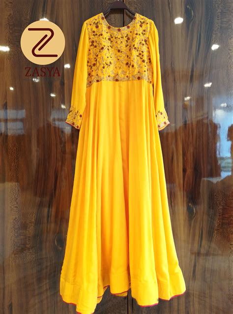 yellow-colored-flared-floor-length-paneled-kurthi-with-french-knots,zardosi-work-at-yoke-and