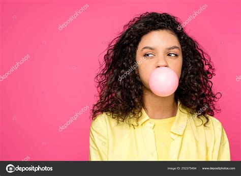 Curly African American Girl Blowing Bubble Gum Isolated Crimson Stock