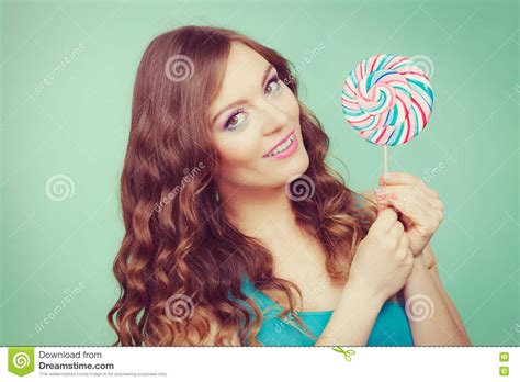 Smiling Girl With Lollipop Candy On Teal Stock Image Image Of Joyful