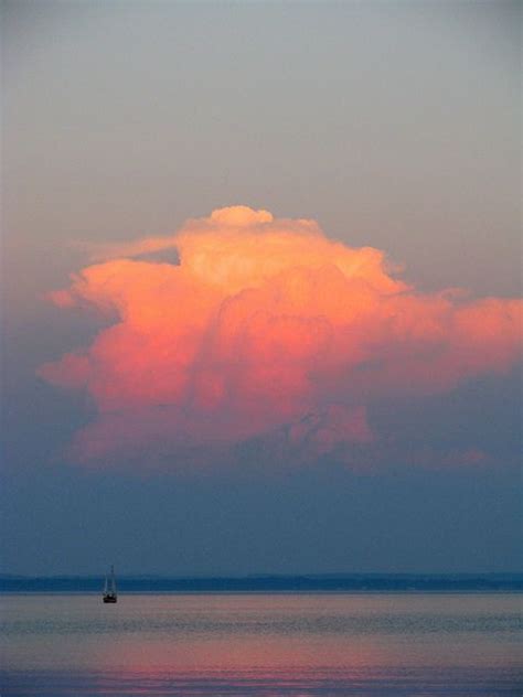 Sunset Lit Cumulus Clouds Over Grand Traverse Bay As Seen From The Old