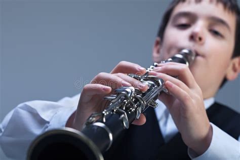 Boy Playing On The Clarinet Stock Image Image Of Boys Hands 31860393