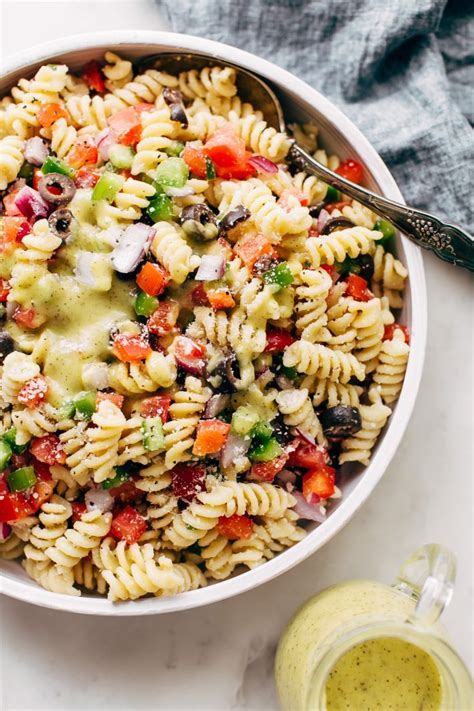 Letting the pasta and veggies sit in the dressing for a while makes a huge difference in flavor. Easy California Pasta Salad with Italian Dressing Recipe | Little Spice Jar