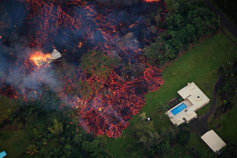 Aerial Pictures Of Houses Being Covered With Lava After Volcanic