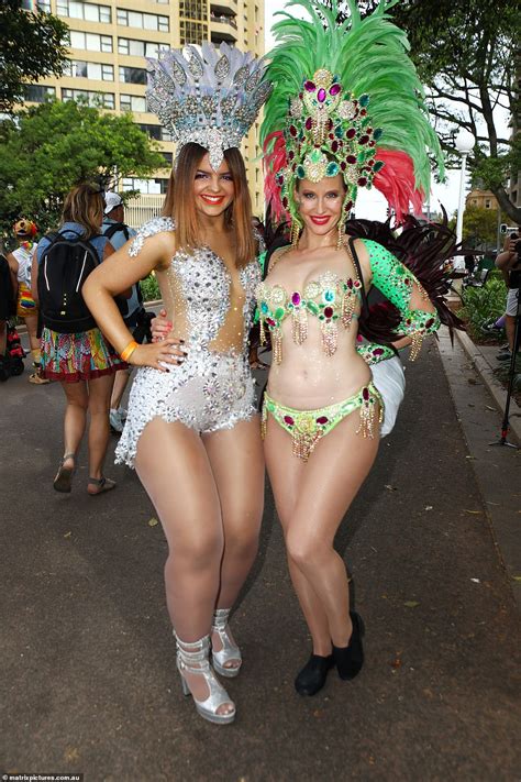 Thousands Of Revellers Show Off Their Bright Coloured Costumes As Mardi