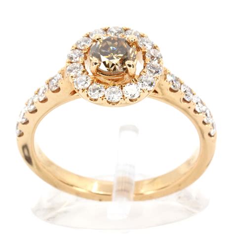 Additional round diamonds adorn the shoulders of the band. Round Brilliant Cut Champagne Diamond Ring with Halo of Diamonds set in 18ct Rose Gold | All Gem ...