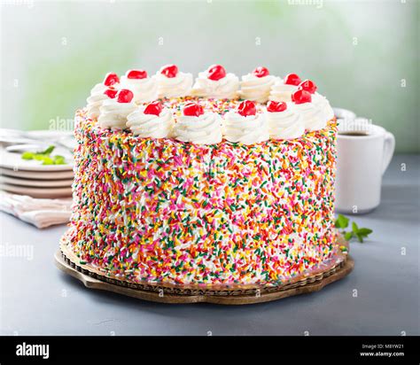 Birthday Cake Covered In Sprinkles Stock Photo Alamy