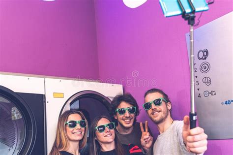 Group Of Young Friends Wearing Green Sunglasses Having Fun Taking A Selfie Stock Image Image