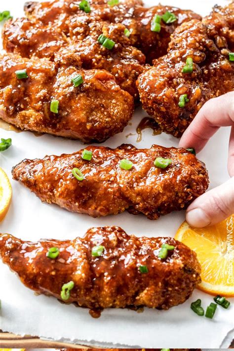 This is an easy chicken dinner the whole family will love! Sweet and Spicy Baked Orange Chicken Tenders | Recipe ...