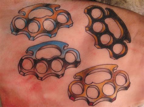 Piggys Brass Knuckles Tattoo Ink Design Tattoomagz › Tattoo