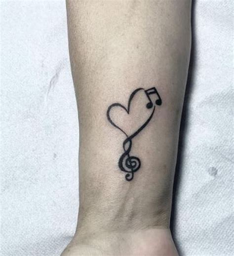 Heart Music Note Tattoos On Wrist