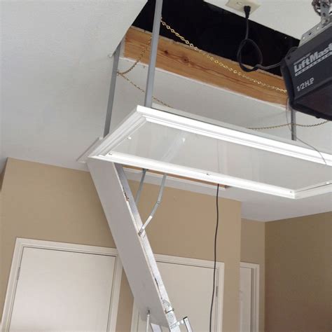 Versalift Install Pictures Attic Lift Attic Lift Diy Attic Storage