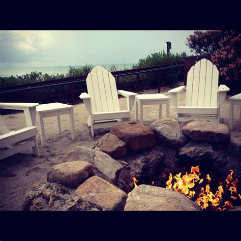 Maybe you would like to learn more about one of these? #beach fire | Beach fire pit, Fire, Outdoor decor