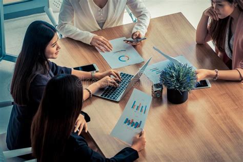 Businesswomen In Meeting Laptop Computer On Table Stock Image Image