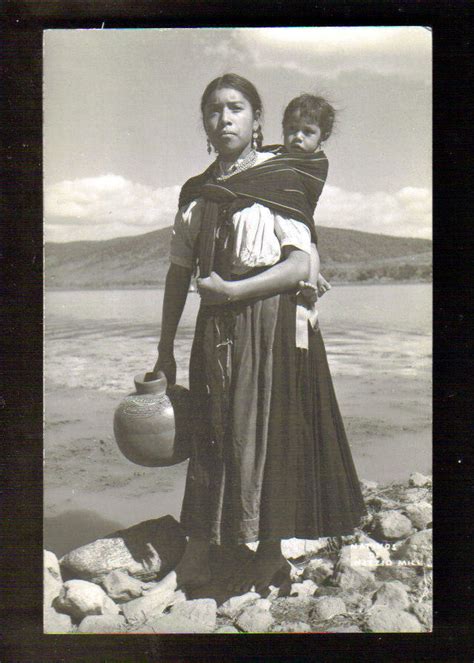 Indigenous Mayanative Purepecha Mother And Her Child Standing On The