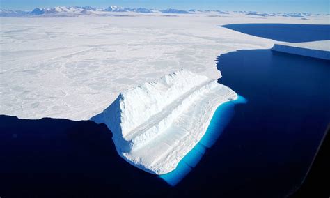 Incredible Nasa Image Shows Glowing Antarctic Iceberg