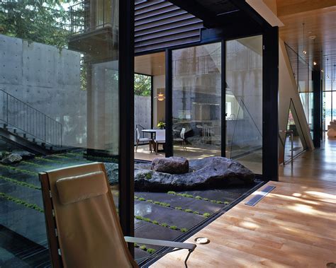 The usual options would be to transform this awkward little area into a patio or a courtyard, but decking can be used successfully to enhance smaller gardens too. ShowCase: Courtyard House on a Steep Site | Features ...