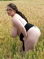 Busty Gina G Strips Outside In A Field Boobgoddess