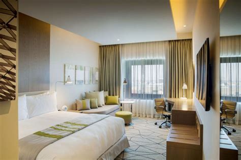 The hotel is within hailing distance tщ twin towers shopping centre, al ghurair centre, dubai frame. Holiday Inn DFC, Dubai | Modern hotel, Hotel interior ...