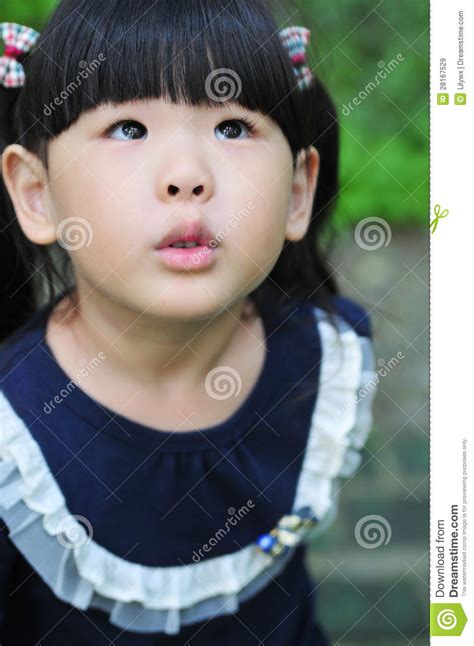 Beautiful Black Eyes Of A Chinese Little Girl Royalty Free