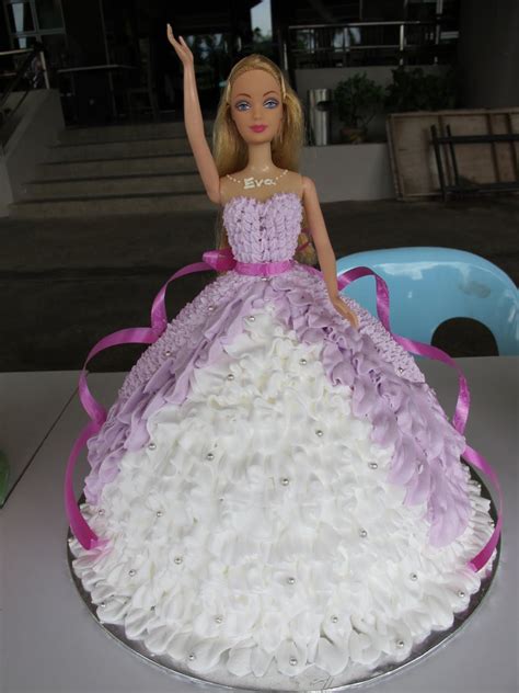 Using the trimmings, roll out an oblong of pink icing and wrap around the body of the doll to. Homemade Barbie Cake Ideas | Search Results for: Barbie ...