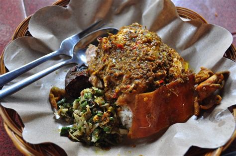It is primarily a classic roasted pork dish! Nasi Babi Guling Ibu Oka, Bali | Nasi