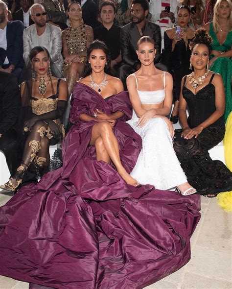 Kim Kardashian Brings The Drama In Purple Dress At Dolce Gabbana Show