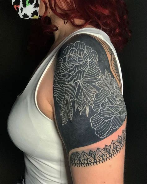 25 Beautiful Blackout Tattoos With White Ink On Top