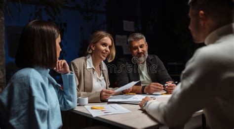 Confident Business People Brainstorming Together Team Working At New
