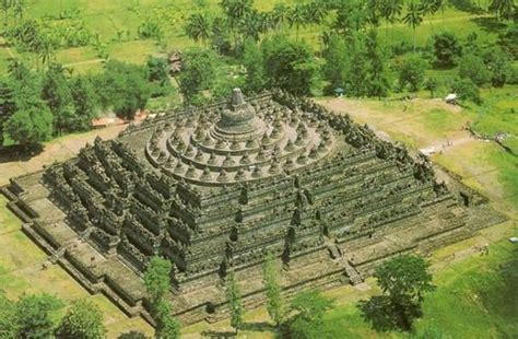 An Aerial View Of A Large Stone Structure Surrounded By Trees