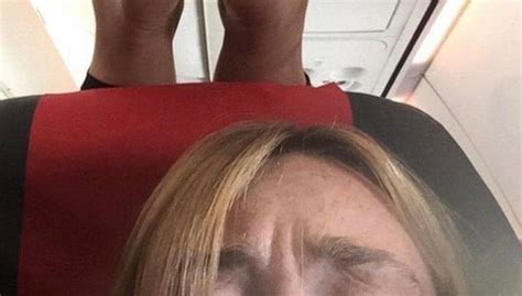 Woman Shares Cringeworthy Selfie Of Passengers Feet On Her Headrest